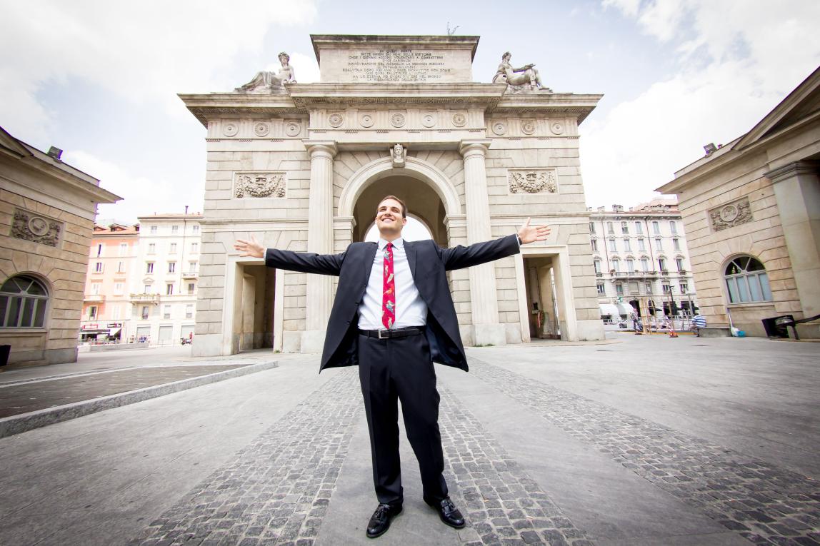 student intern standing in front of Porta Garibaldi in Milan