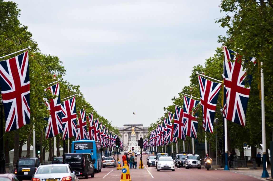 a British flag-lined street leading up to the Victoria Memorial