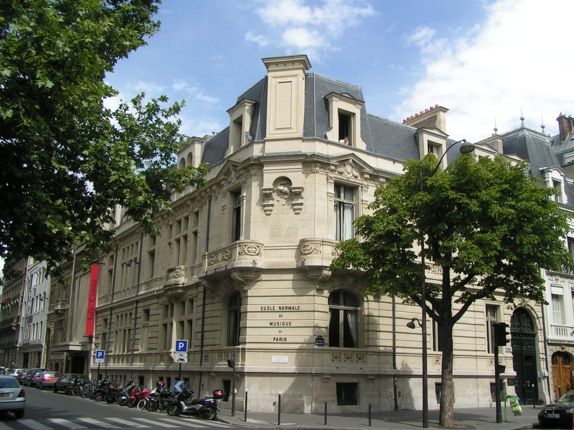 A French-style building with the text "Ecole Normale de Musique de Paris" (the Normal School of Music in Paris).