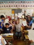 a Tokyo student in an elementary school with students for their field placement