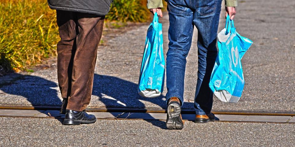 People walking with shopping bags