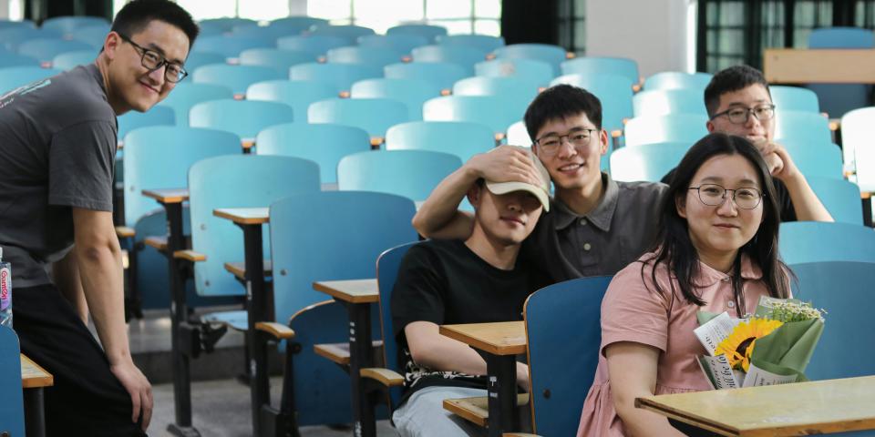 A group of Chinese students sitting in a lecture hall in a Beijing university