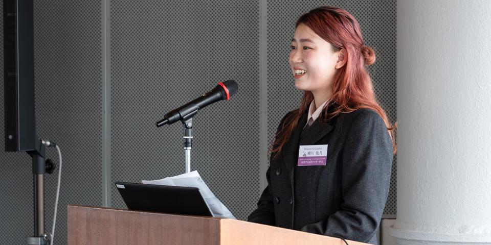 A student from Kyoto University of Foreign Studies giving a presentation at the SAF Annual Meeting